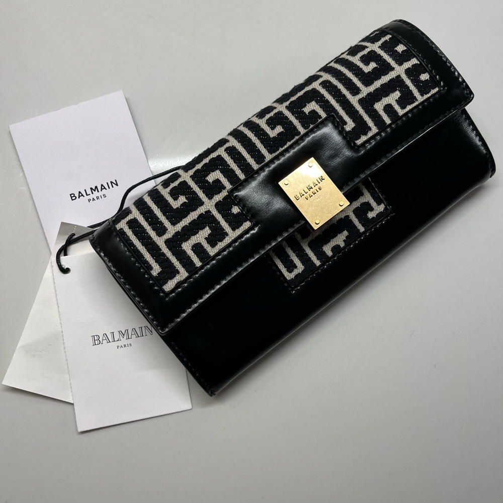 Balmain
monogram-jacquard flat wallet